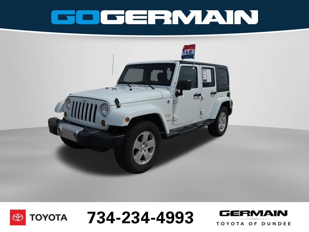 Used 2012 Jeep Wrangler Unlimited Sahara w/ Dual Top Group AWD/4WD image 1