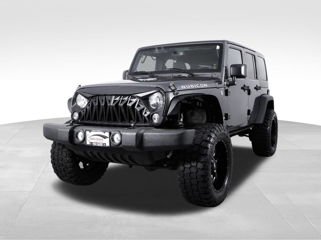 Used 2014 Jeep Wrangler Unlimited Rubicon w/ Dual Top Group AWD/4WD image 3