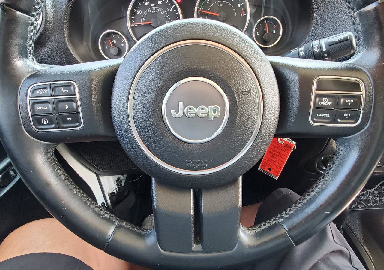 Used 2012 Jeep Wrangler Unlimited Sahara w/ Dual Top Group AWD/4WD image 11