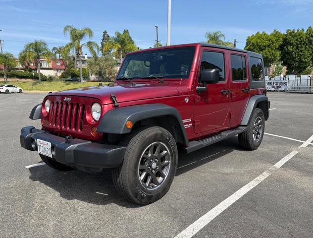 Used 2013 Jeep Wrangler Unlimited Sport image 1
