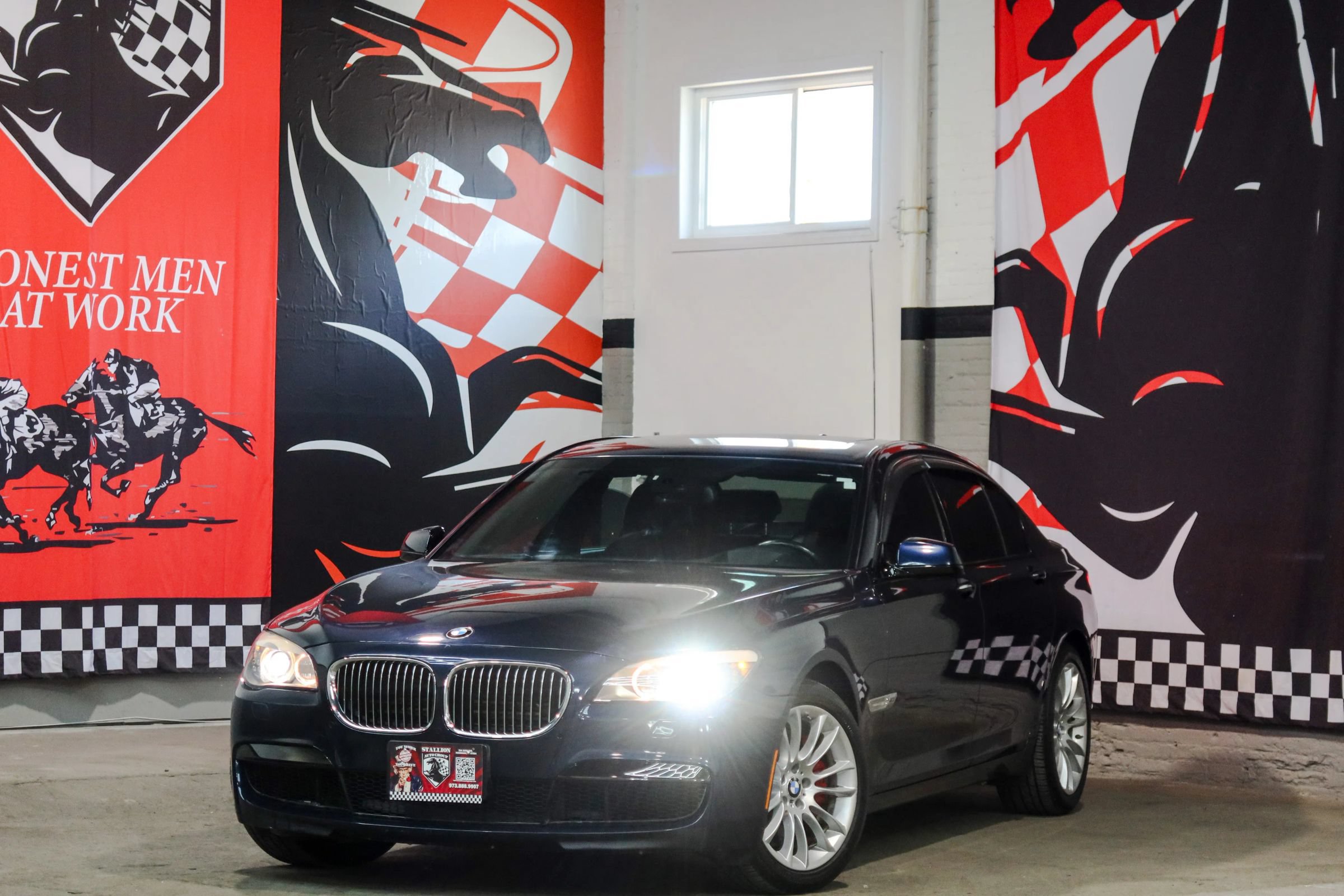 Used 2012 BMW 750i xDrive AWD/4WD image 1