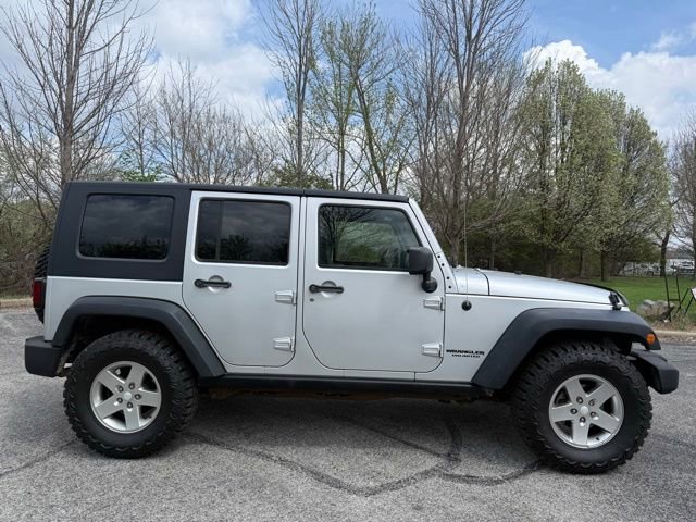 Used 2010 Jeep Wrangler Unlimited Rubicon w/ Dual Top Group AWD/4WD image 2