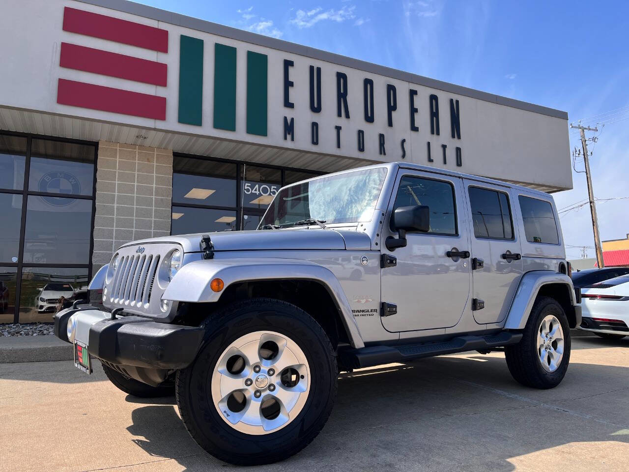 Used 2015 Jeep Wrangler Unlimited Sahara w/ Dual Top Group image 1