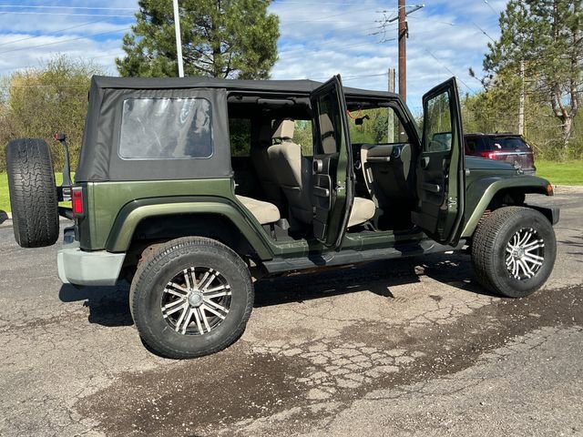 Used 2009 Jeep Wrangler Unlimited Sahara w/ Dual Top Group AWD/4WD image 27