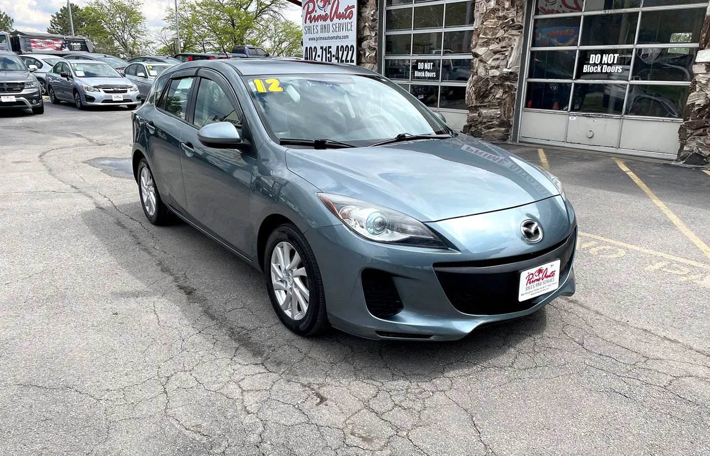 Used 2012 MAZDA MAZDA3 i Grand Touring w/ Tech Pkg FWD image 1