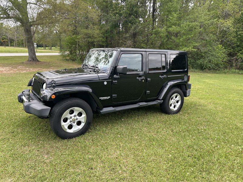 Used 2012 Jeep Wrangler Unlimited Sahara AWD/4WD image 2