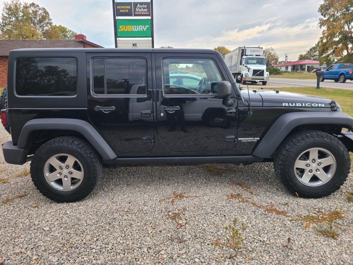 Used 2012 Jeep Wrangler Unlimited Rubicon w/ Dual Top Group image 2
