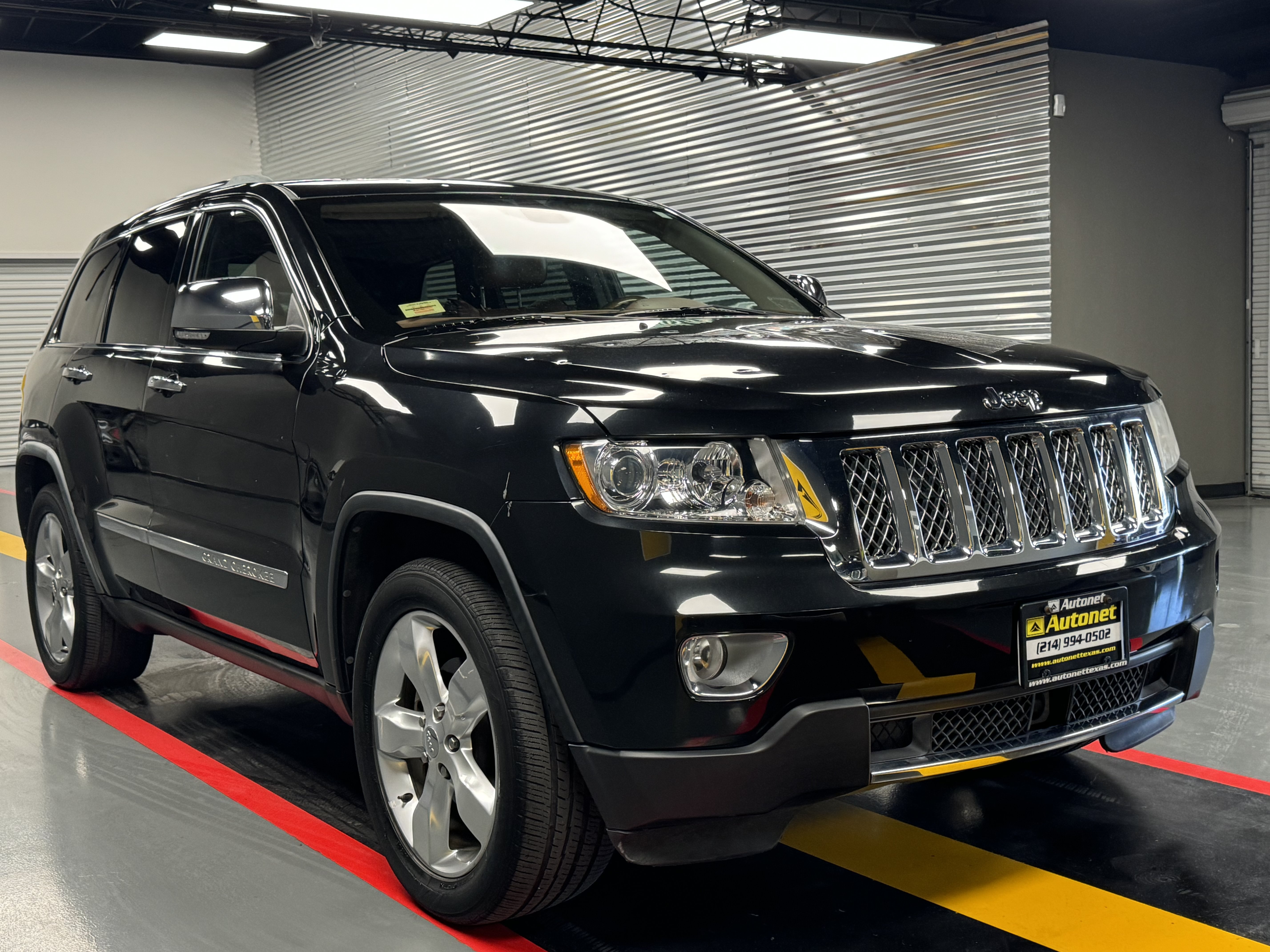 Used 2011 Jeep Grand Cherokee Overland Summit AWD/4WD image 7