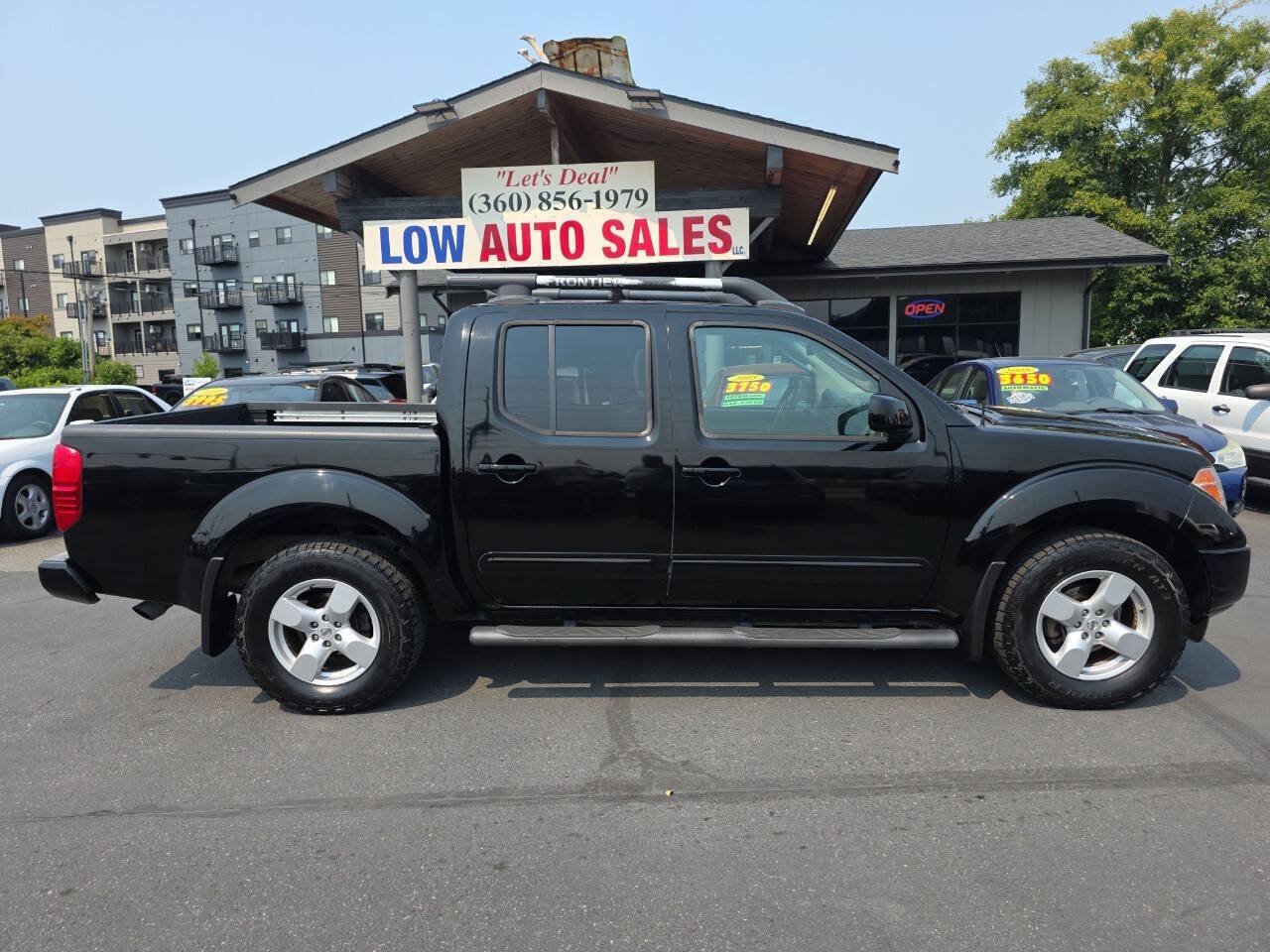 Used 2006 Nissan Frontier LE w/ (X01) Leather Pkg AWD/4WD image 2
