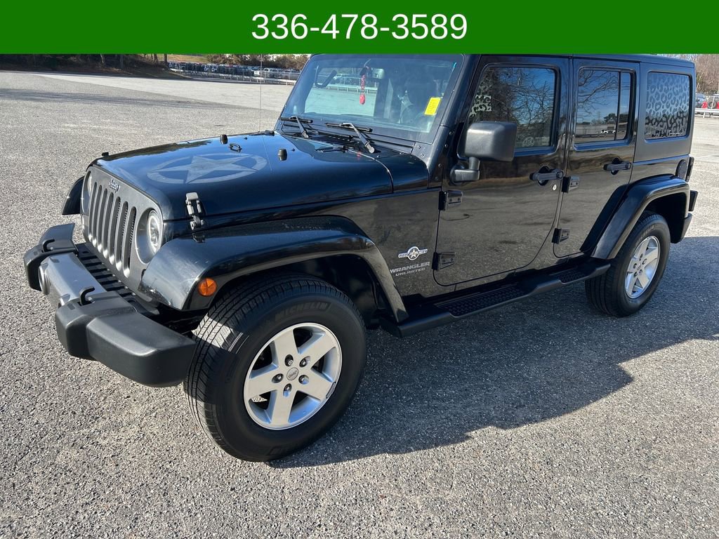 Used 2014 Jeep Wrangler Unlimited Sport image 1