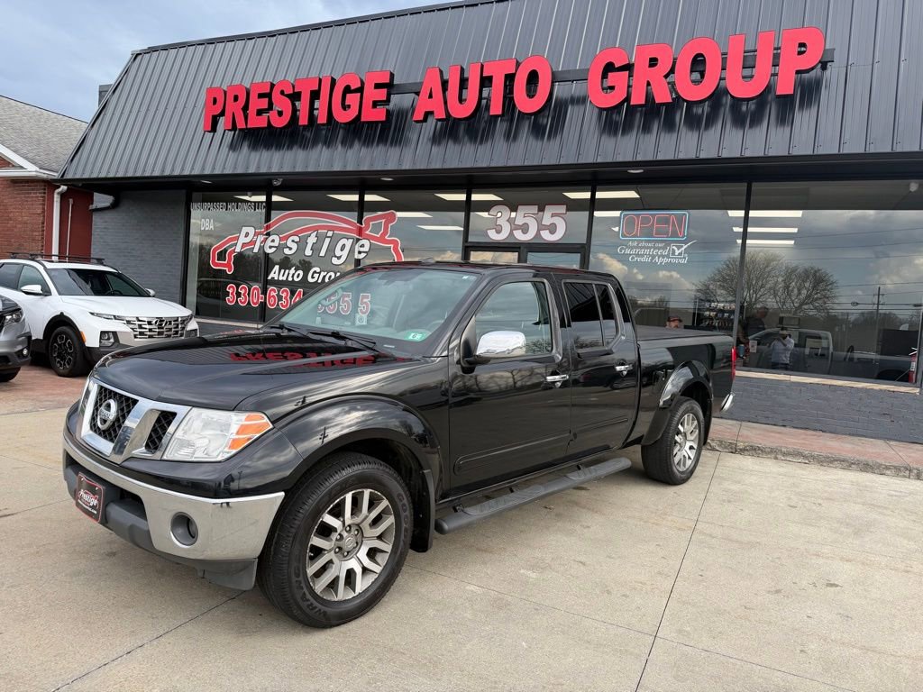 Used 2013 Nissan Frontier SL image 1