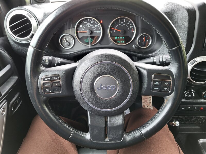 Used 2014 Jeep Wrangler Unlimited Sahara w/ Dual Top Group AWD/4WD image 16