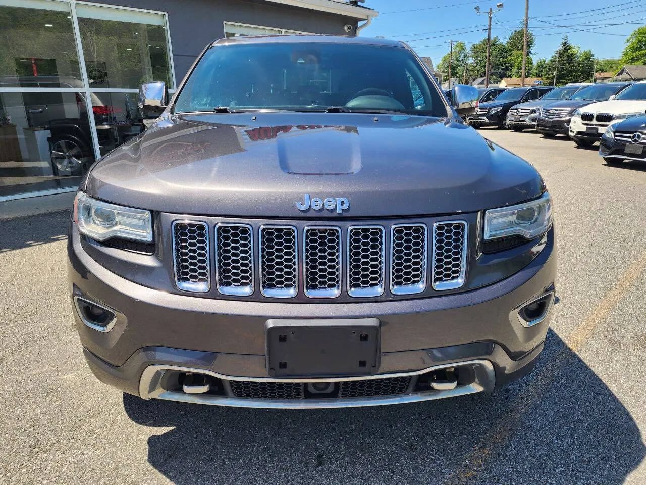 Used 2014 Jeep Grand Cherokee Overland w/ Advanced Technology Group AWD/4WD image 2