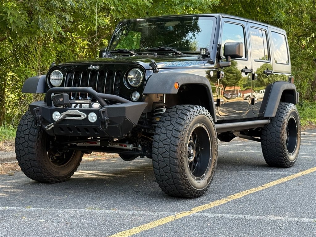 Used 2015 Jeep Wrangler Unlimited Rubicon w/ Dual Top Group AWD/4WD image 16