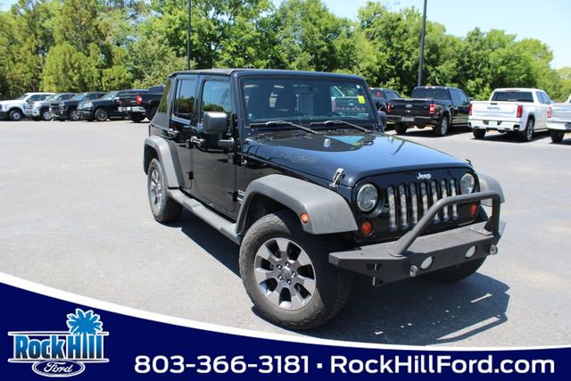 Used 2012 Jeep Wrangler Unlimited Sport AWD/4WD image 1