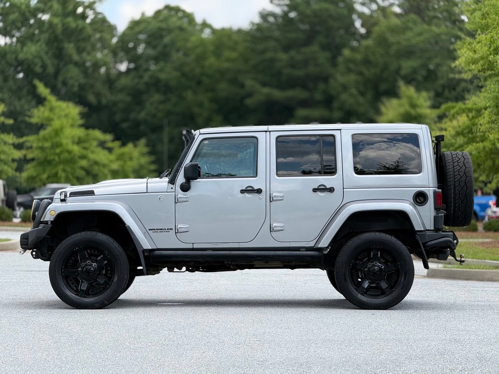 Used 2014 Jeep Wrangler Unlimited Rubicon w/ Dual Top Group AWD/4WD image 9