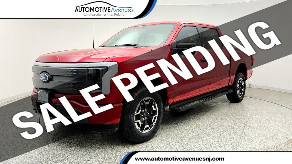 Used 2023 Ford F150 Lightning XLT AWD/4WD image 1