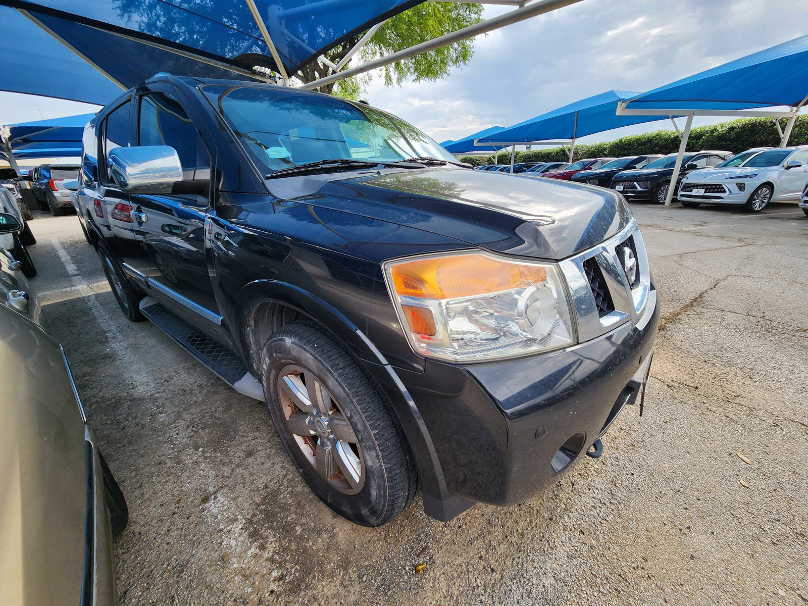 Used 2014 Nissan Armada Platinum image 1