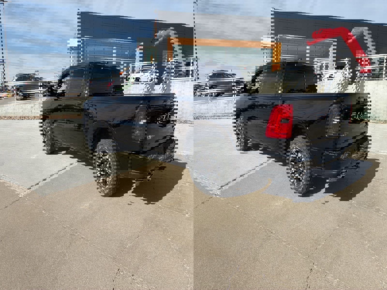 Used 2025 RAM 1500 Laramie w/ Sport Appearance Package image 3