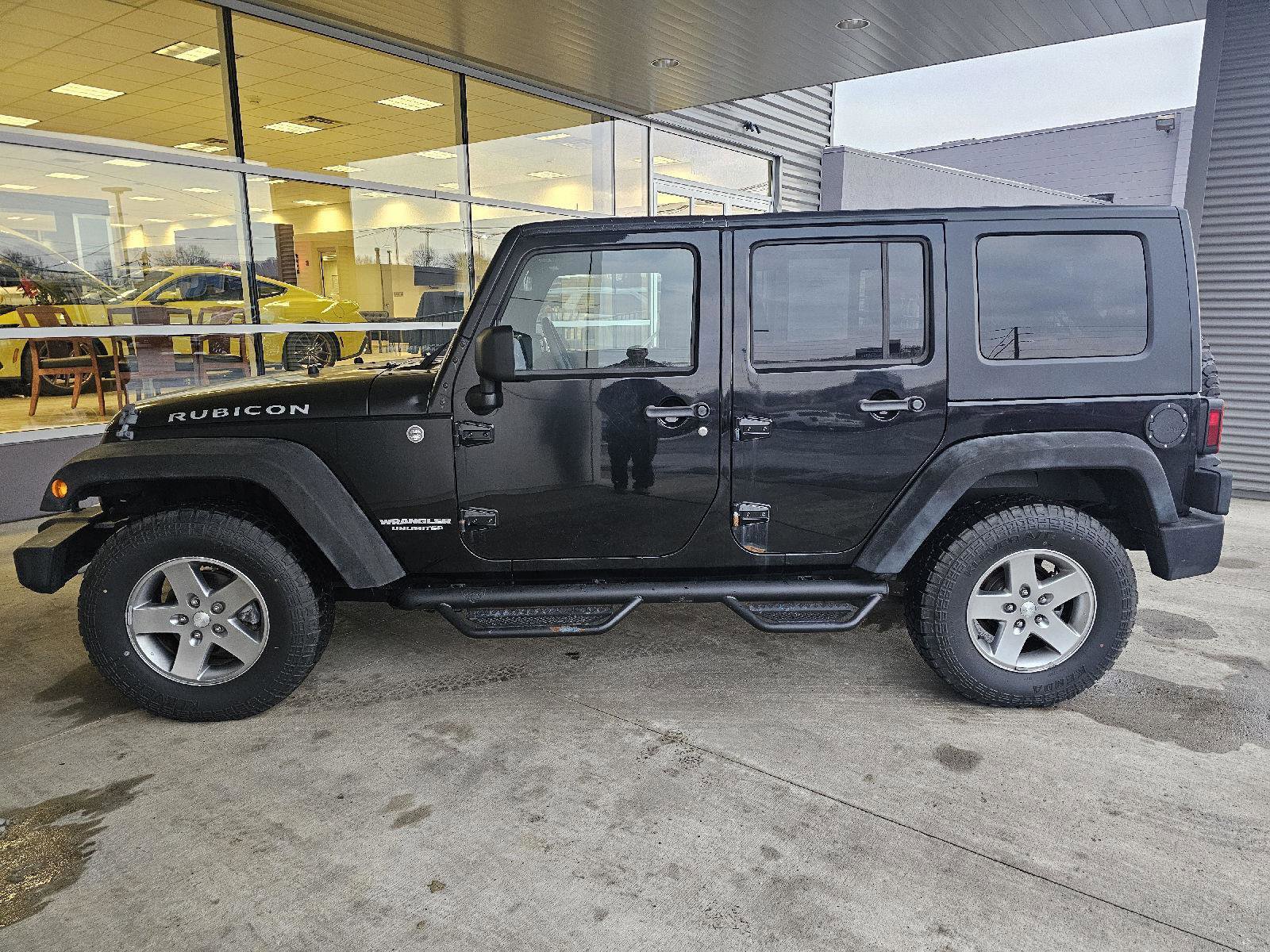Used 2010 Jeep Wrangler Unlimited Rubicon w/ Dual Top Group image 2