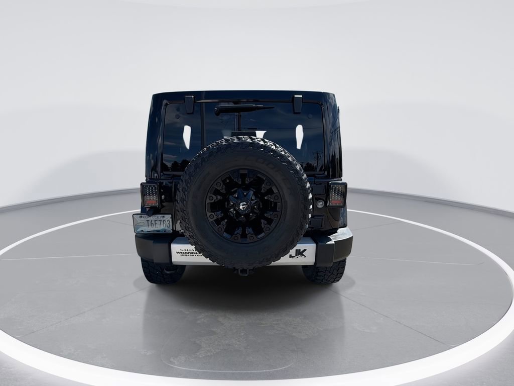 Used 2014 Jeep Wrangler Unlimited Sahara w/ Dual Top Group AWD/4WD image 7