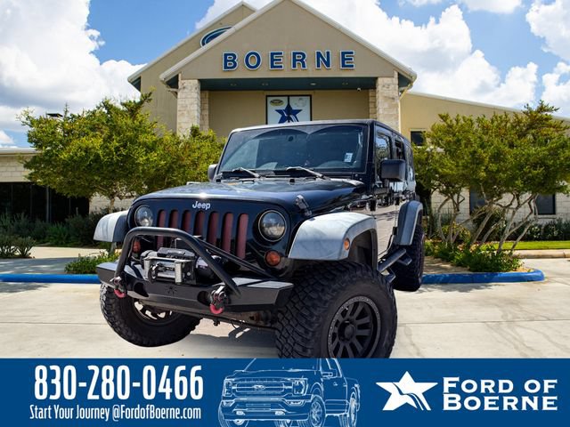 Used 2012 Jeep Wrangler Unlimited Sport AWD/4WD image 1