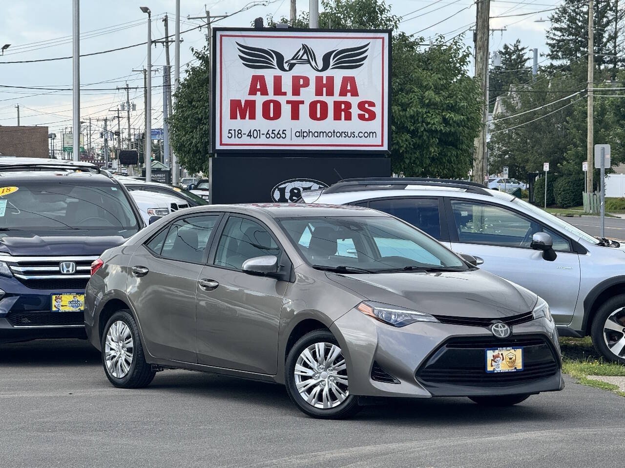 Used 2017 Toyota Corolla LE w/ Carpet Mat Package (TMS) FWD image 1