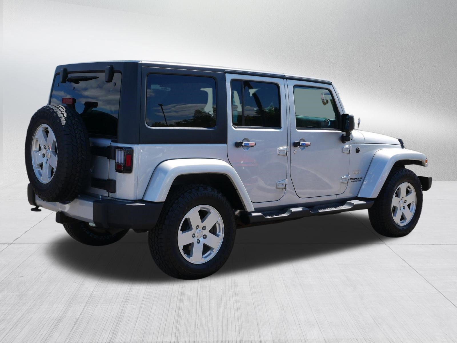 Used 2012 Jeep Wrangler Unlimited Sahara w/ Dual Top Group AWD/4WD image 7