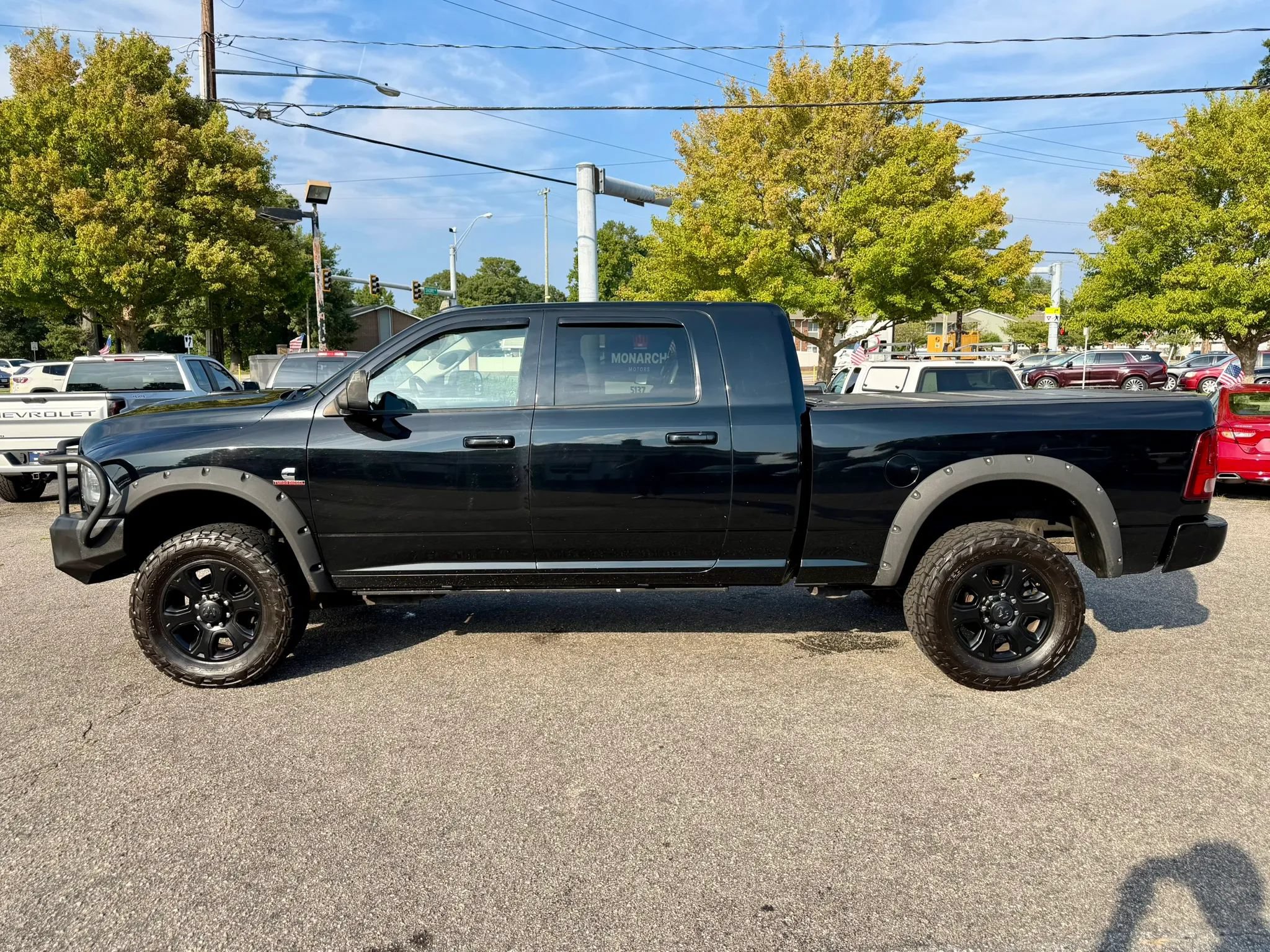 Used 2014 RAM 2500 Laramie w/ Black Appearance Group AWD/4WD image 2