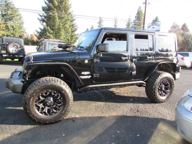 Used 2012 Jeep Wrangler Unlimited Sahara AWD/4WD image 1