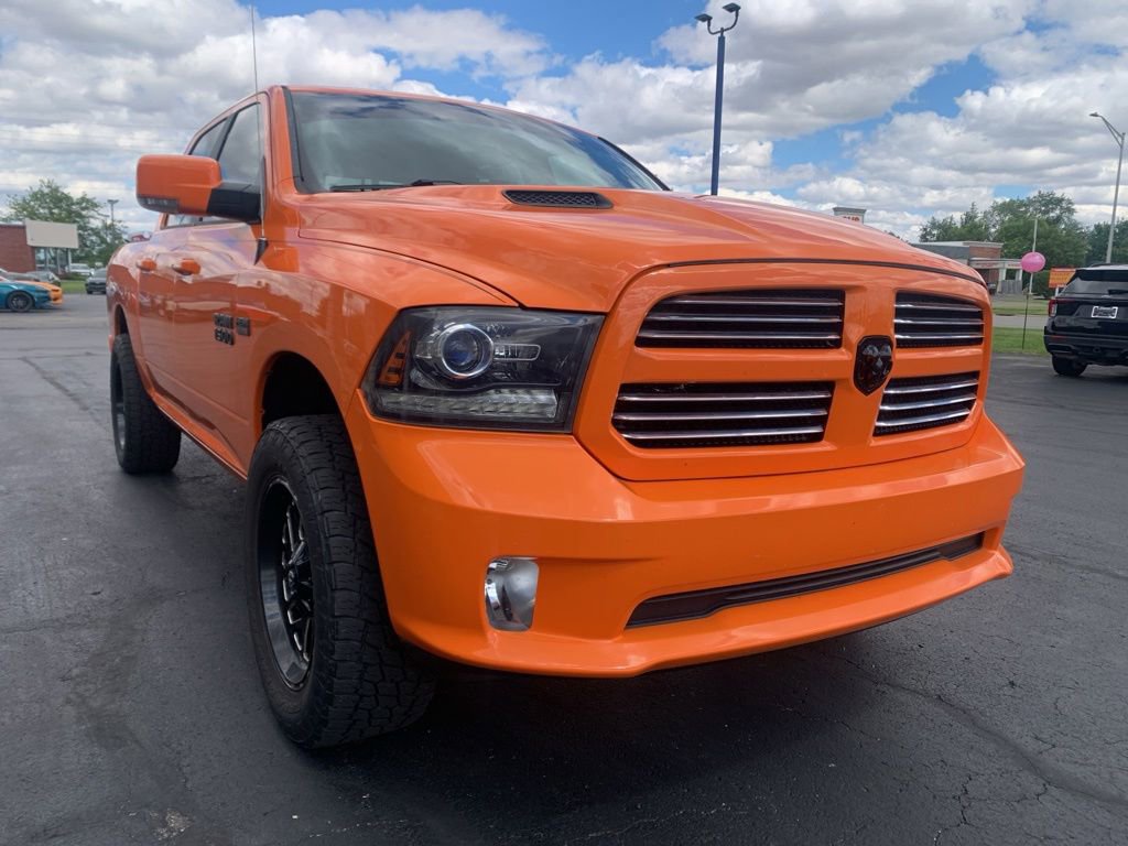 Used 2017 RAM 1500 Sport w/ Ignition Orange Sport Package AWD/4WD image 1