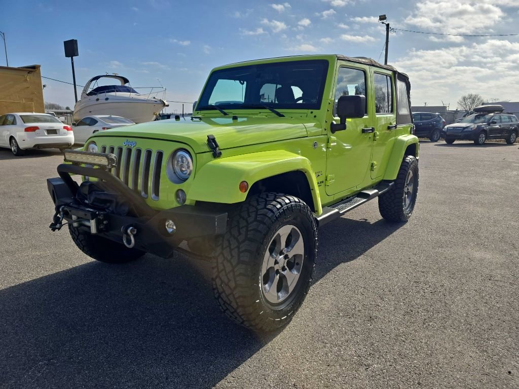 Used 2016 Jeep Wrangler Unlimited Sahara image 1