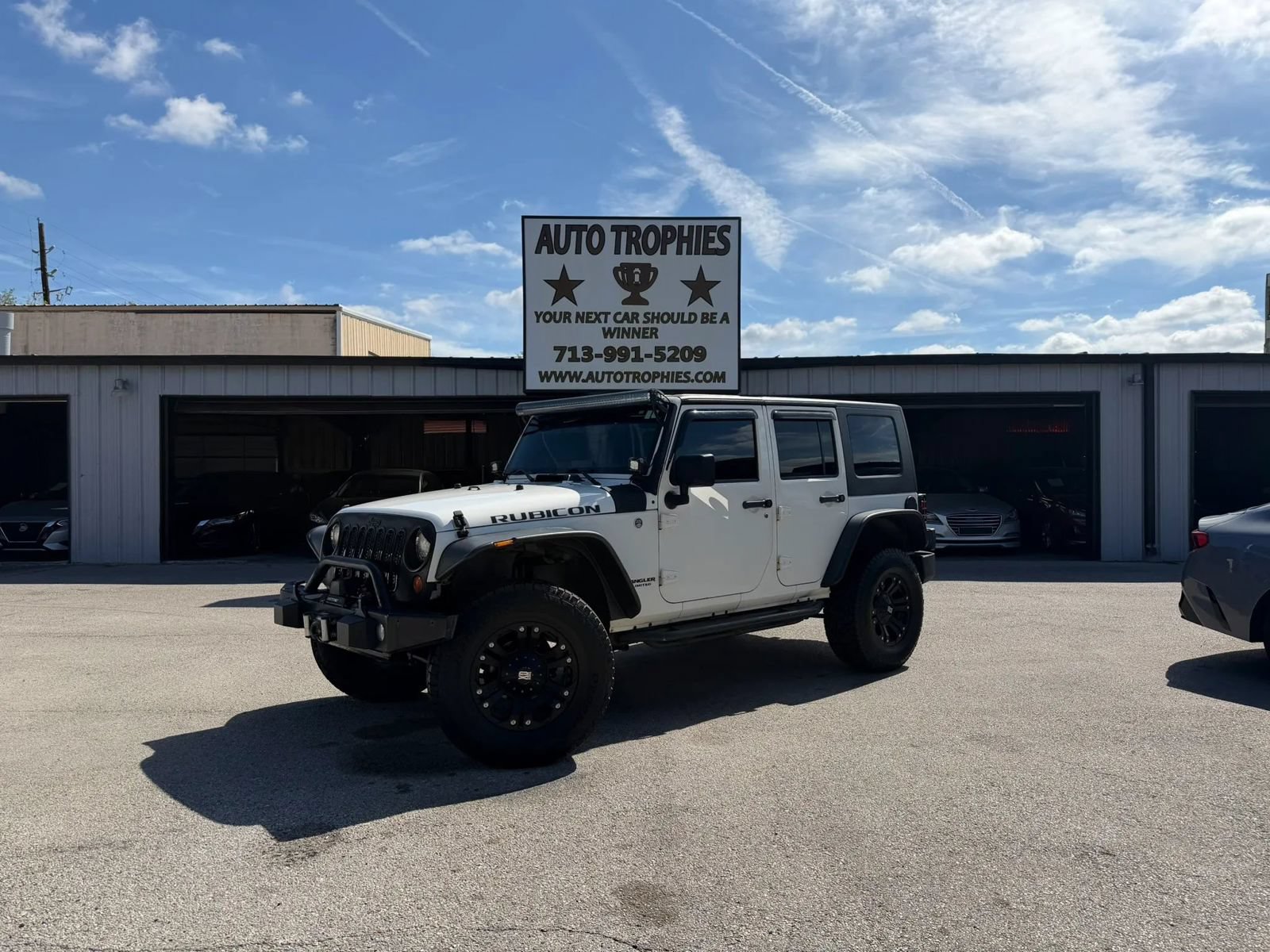 Used 2010 Jeep Wrangler Unlimited Rubicon w/ Trailer Tow Group AWD/4WD image 1
