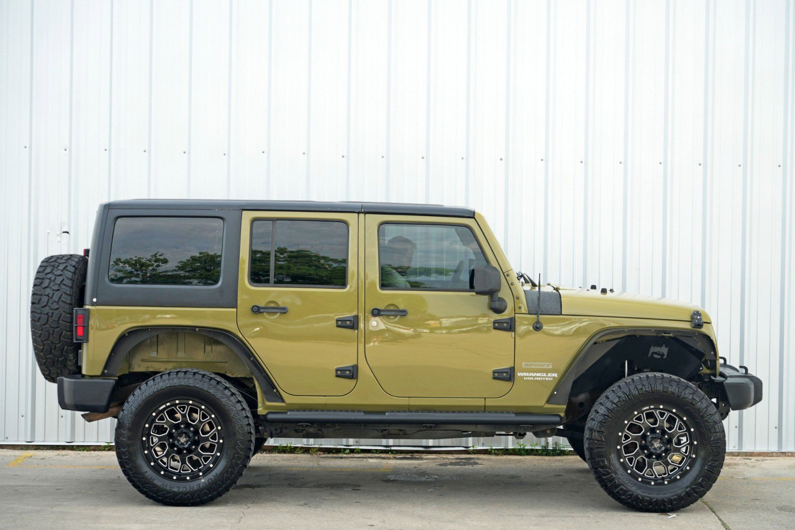 Used 2013 Jeep Wrangler Unlimited Sport w/ Mopar Black Appearance Group image 44