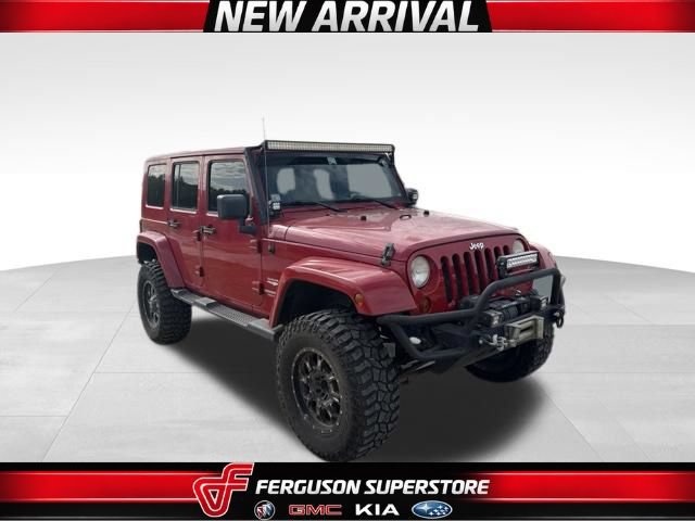 Used 2010 Jeep Wrangler Unlimited Sahara AWD/4WD image 1