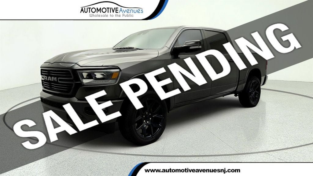 Used 2021 RAM 1500 Laramie AWD/4WD image 1