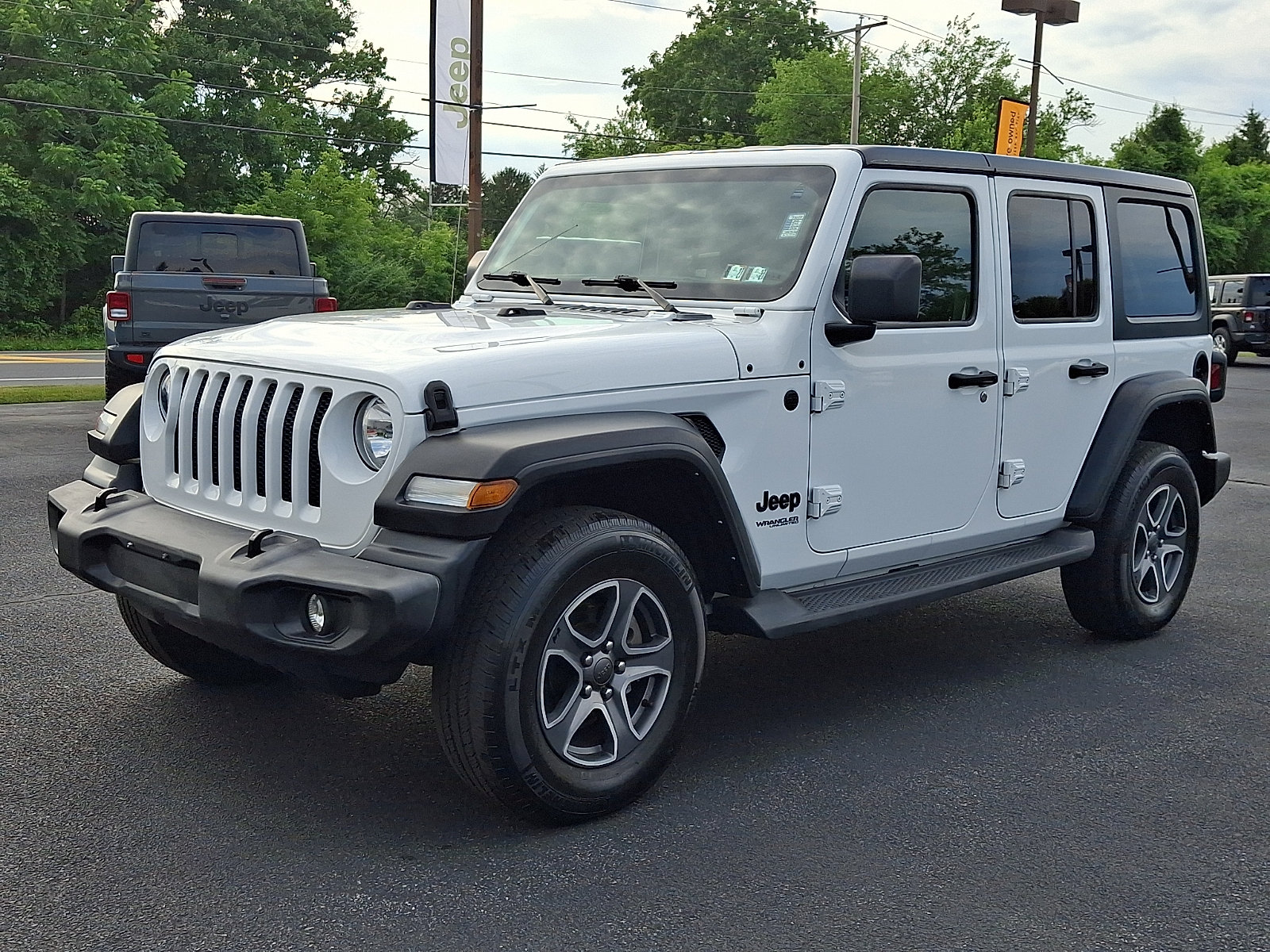 Certified 2022 Jeep Wrangler Unlimited Sport AWD/4WD image 1