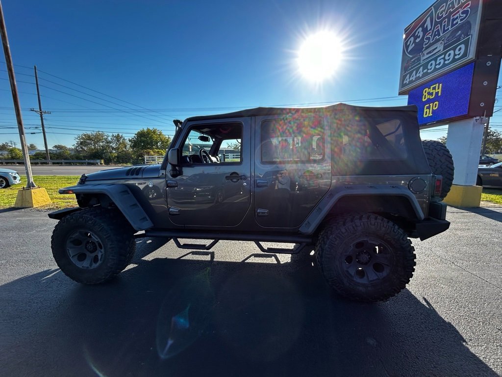 Used 2016 Jeep Wrangler Unlimited Sahara w/ Max Tow Package image 1