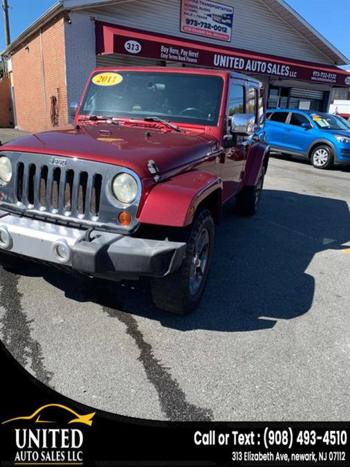 Used 2011 Jeep Wrangler Unlimited Sahara w/ Mopar Chrome Edition Group AWD/4WD image 2