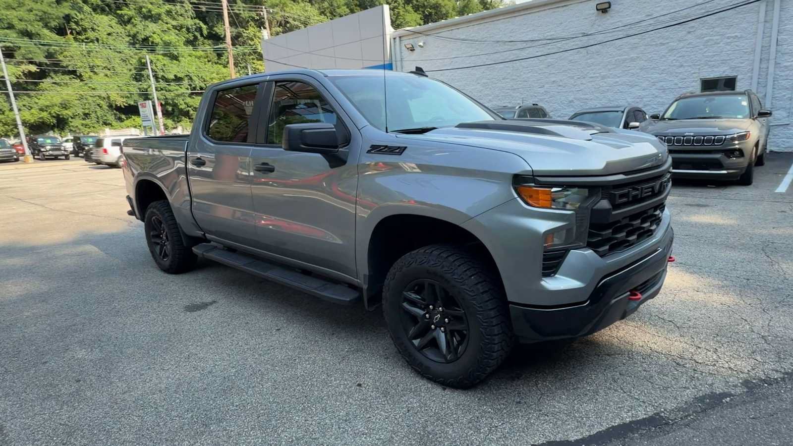 Certified 2024 Chevrolet Silverado 1500 Custom Trail Boss w/ LPO, Dark Essentials Package AWD/4WD image 2