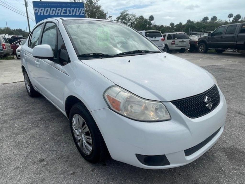 Used 2013 Suzuki SX4 LE image 1