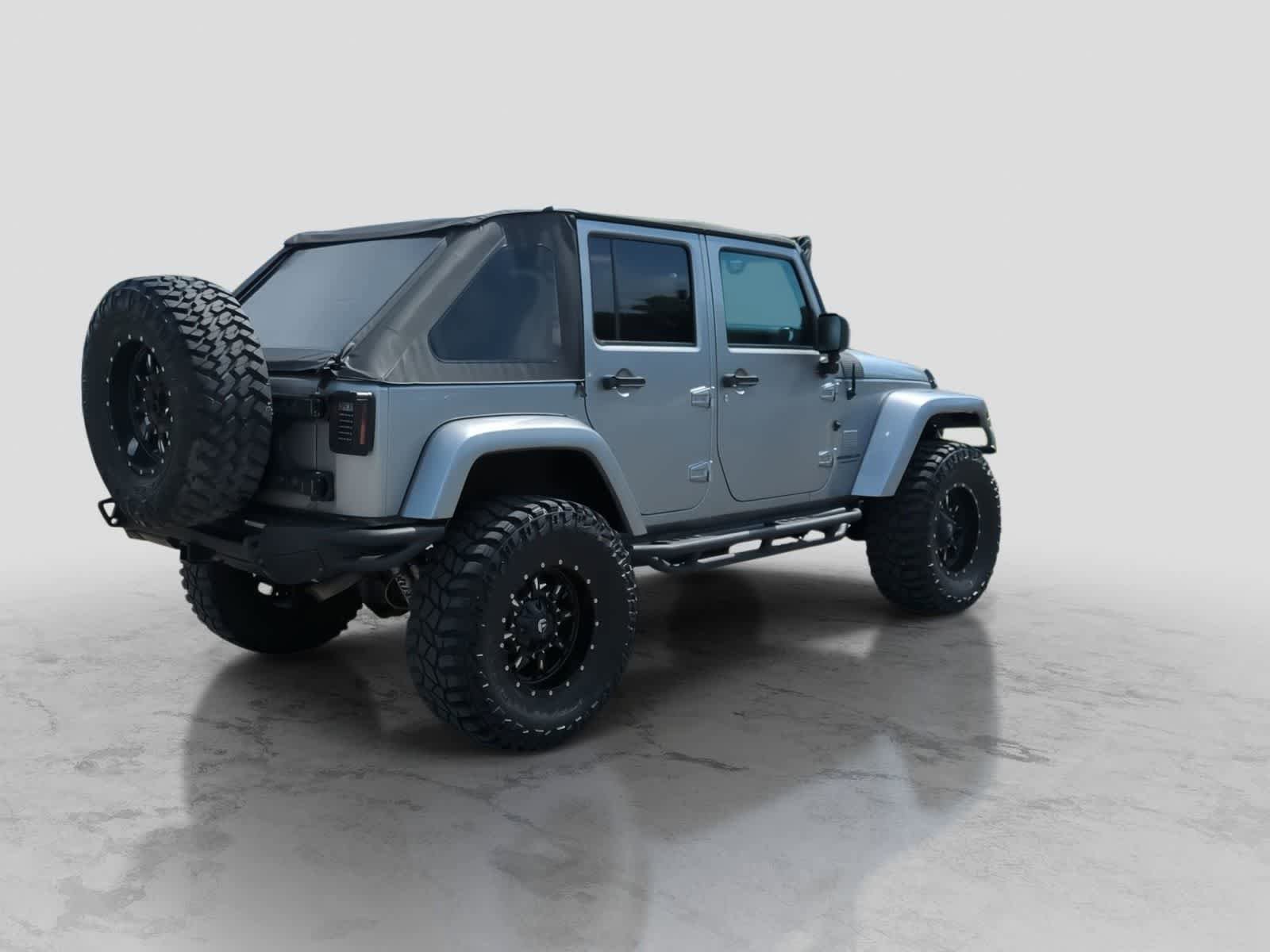 Used 2014 Jeep Wrangler Unlimited Sahara w/ Dual Top Group AWD/4WD image 8