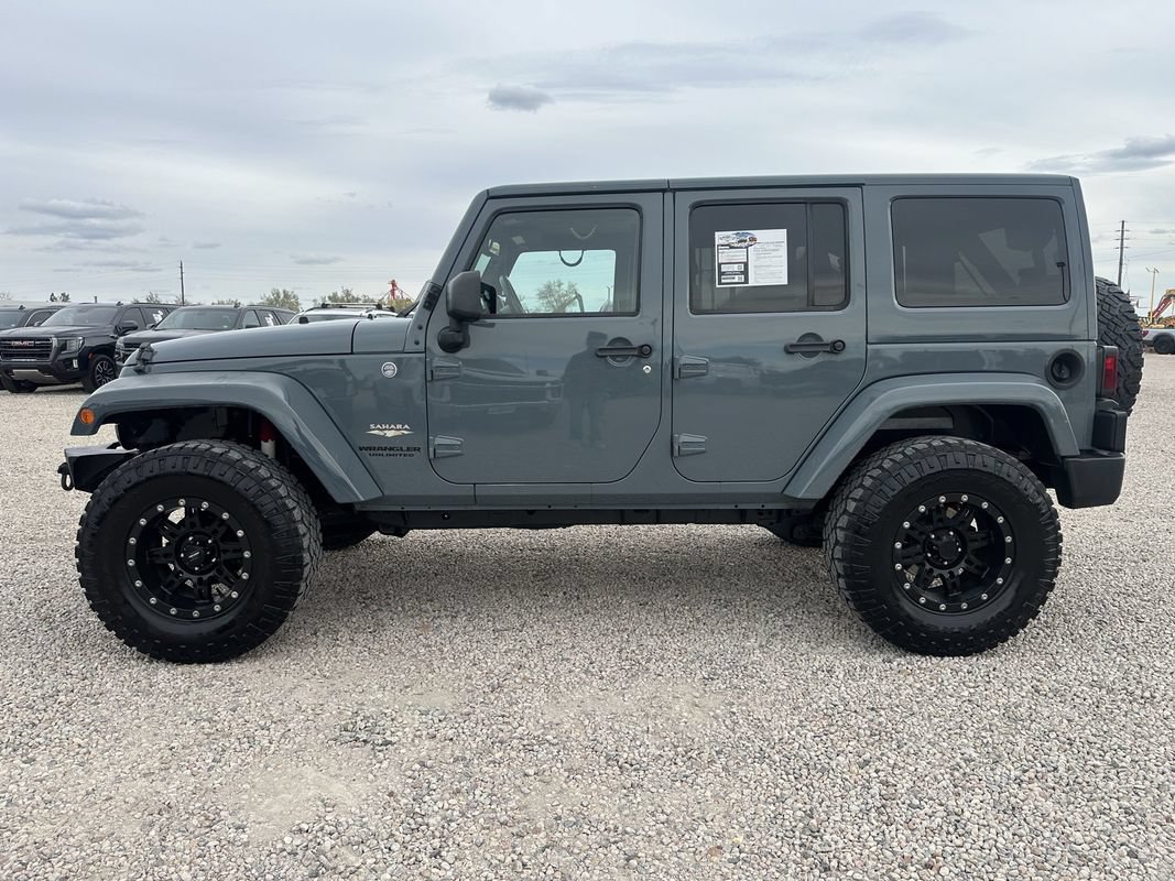 Used 2014 Jeep Wrangler Unlimited Sahara w/ Connectivity Group AWD/4WD image 6
