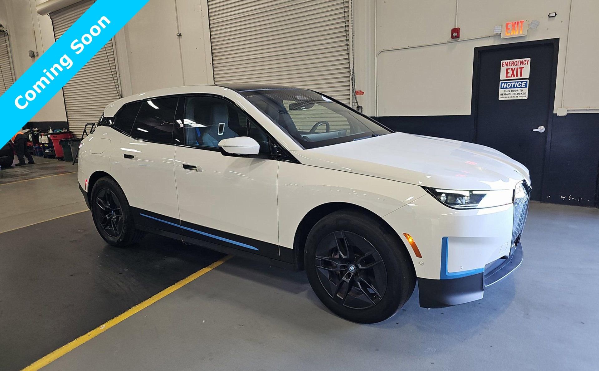 Used 2023 BMW iX xDrive50 w/ BMW I Signature Blue Package image 1