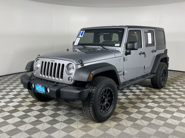 Used 2014 Jeep Wrangler Unlimited Sport w/ Mopar Black Appearance Group image 1