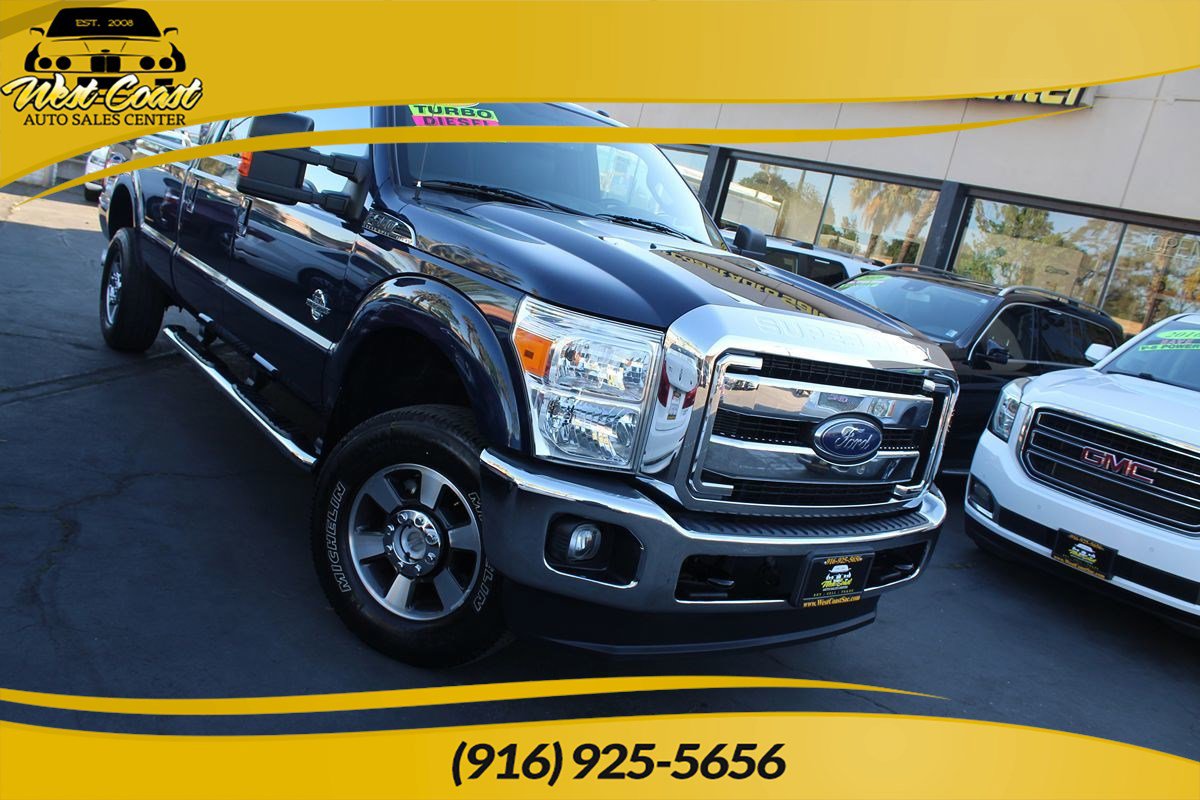 Used 2014 Ford F350 Lariat AWD/4WD image 1