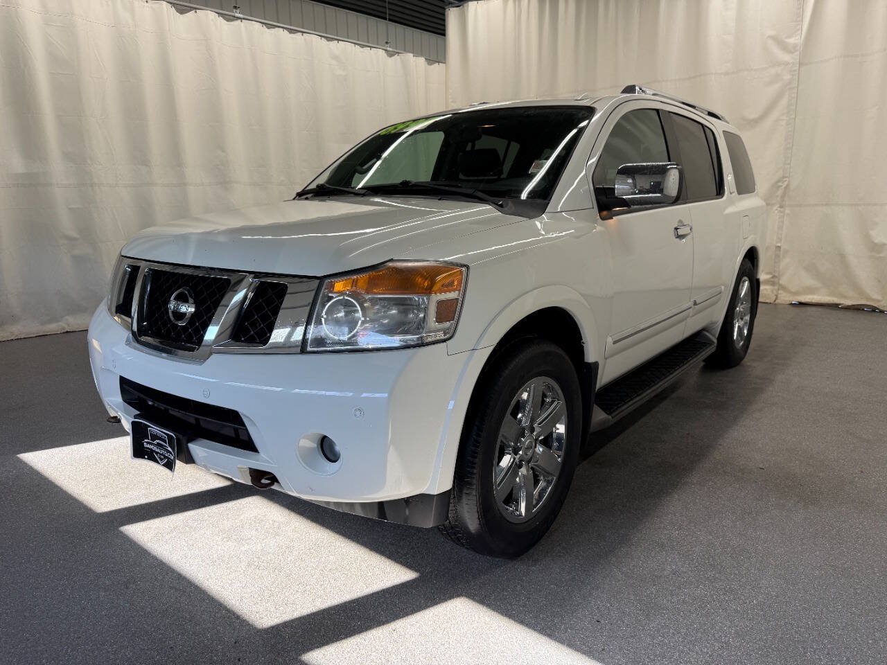 Used 2014 Nissan Armada Platinum w/ 2nd Row Captain Seat Package AWD/4WD image 1