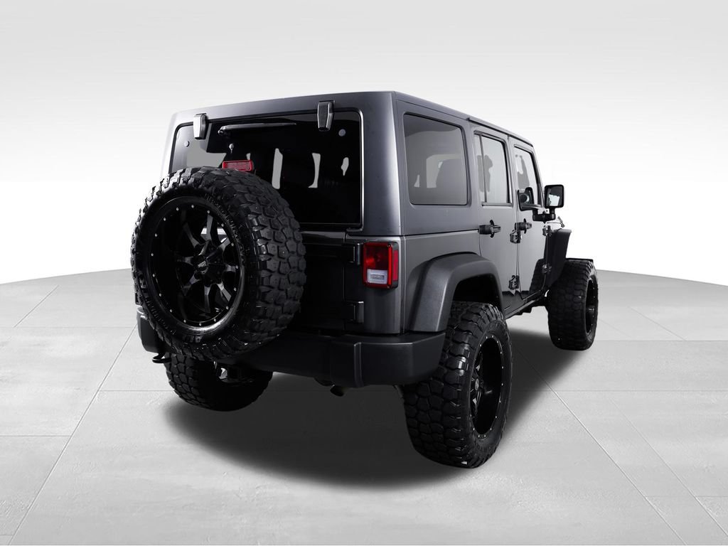 Used 2014 Jeep Wrangler Unlimited Rubicon w/ Dual Top Group AWD/4WD image 8