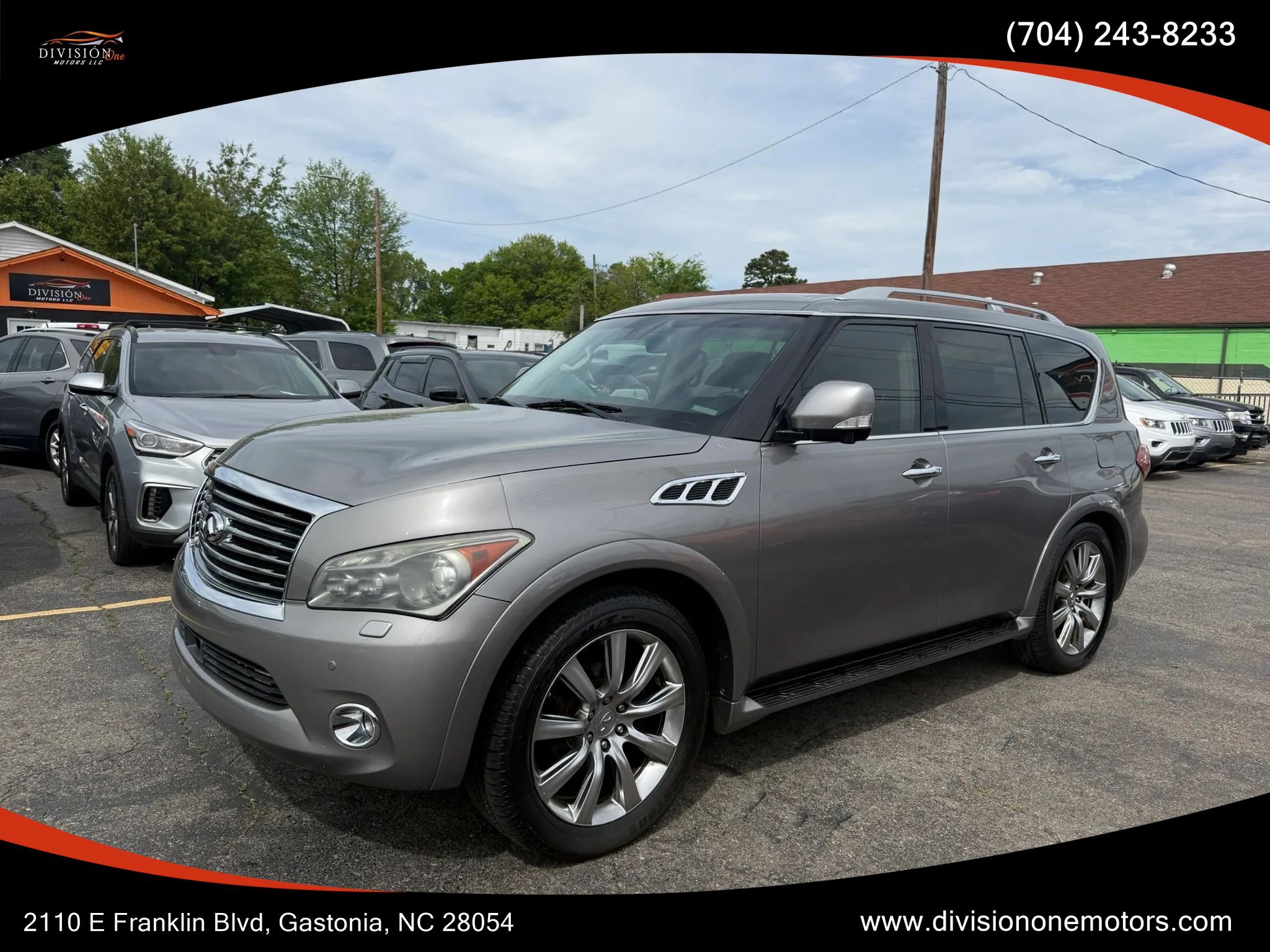 Used 2012 INFINITI QX56 4WD w/ Deluxe Touring Pkg image 1