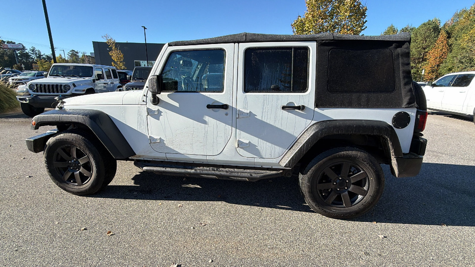 Used 2014 Jeep Wrangler Unlimited Sahara AWD/4WD image 11